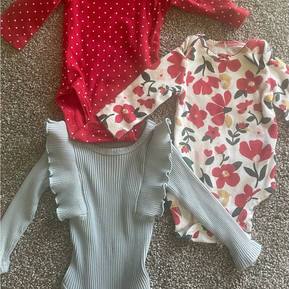 Set of Three Baby Bodysuits - Red, Floral, and Blue